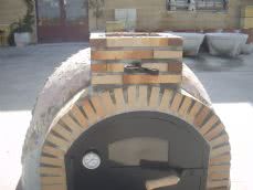 HORNO MONTADO EN PIEDRA Y AZULEJO DE 90 CM